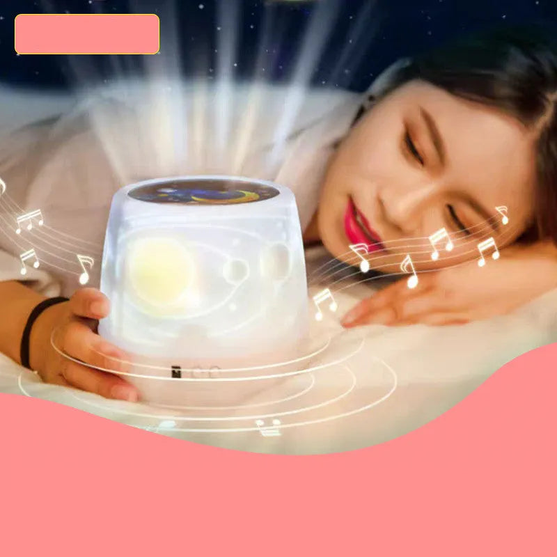 Pruixin PRX1363 LED projector night light showing starry sky or love pattern projection on a bedroom wall.