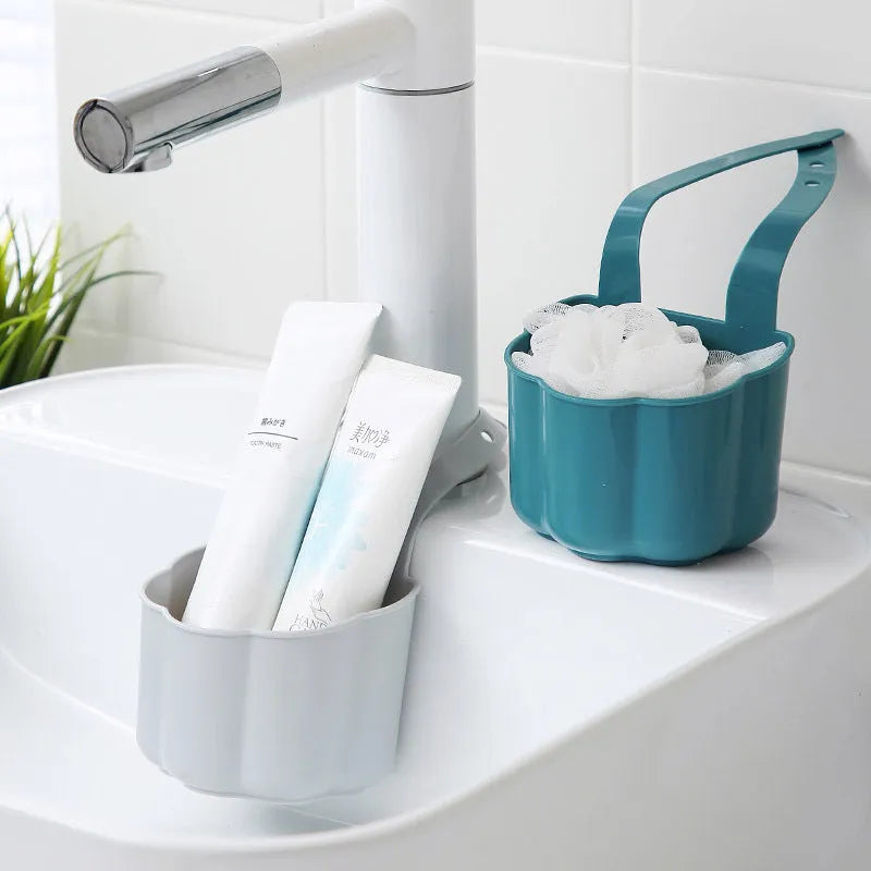 Nordic-style plastic sink drain basket in dark blue, measuring 20cm by 10cm.