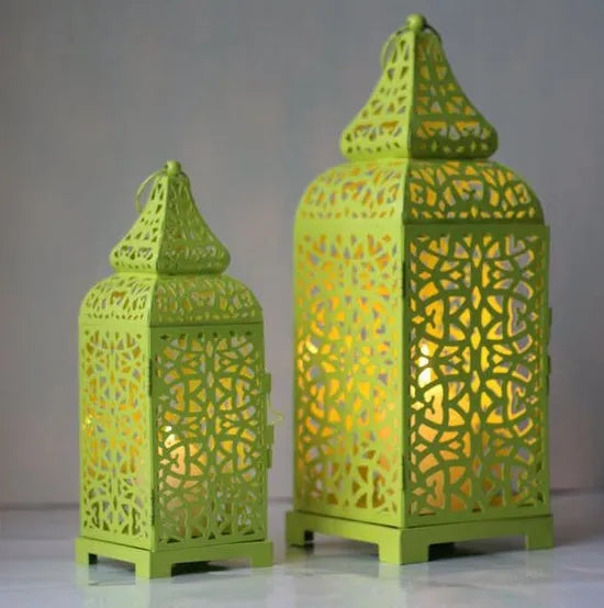 Blue Moroccan geometric iron candelabra with hollow retro design for candle display.