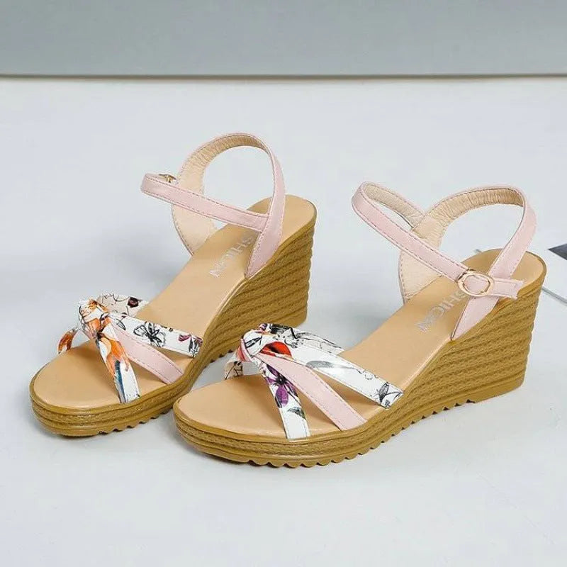 Women's pink PU wedge sandals with fish mouth design and buckle closure on a waterproof platform sole.