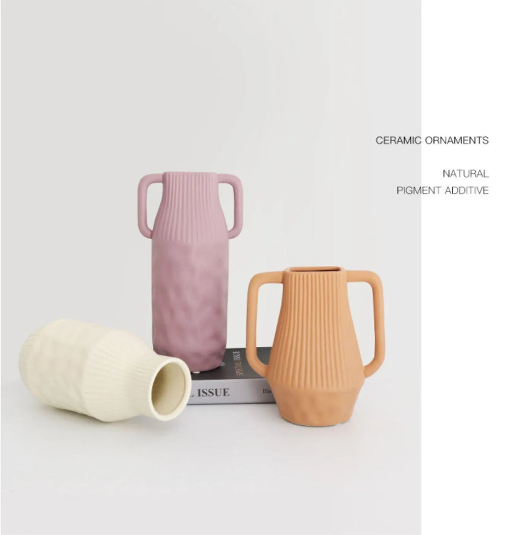 Nordic style hammer-finish ceramic vase in Morandi colours on wooden surface