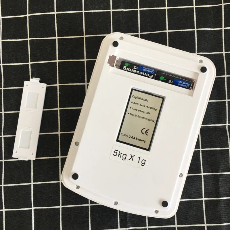 SF-400A black electronic kitchen scale on a countertop showing a 10kg weight reading