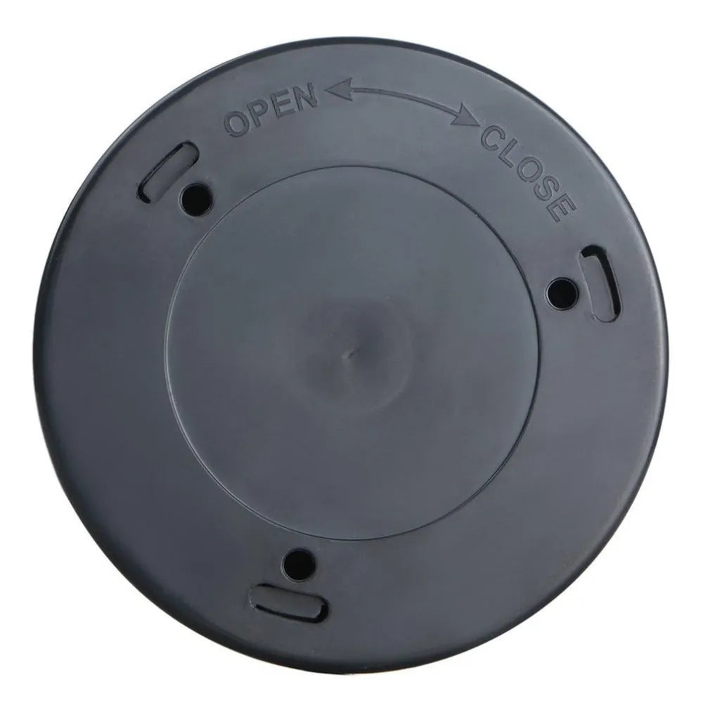 Silver-coloured circular wireless motion sensor night light on a surface