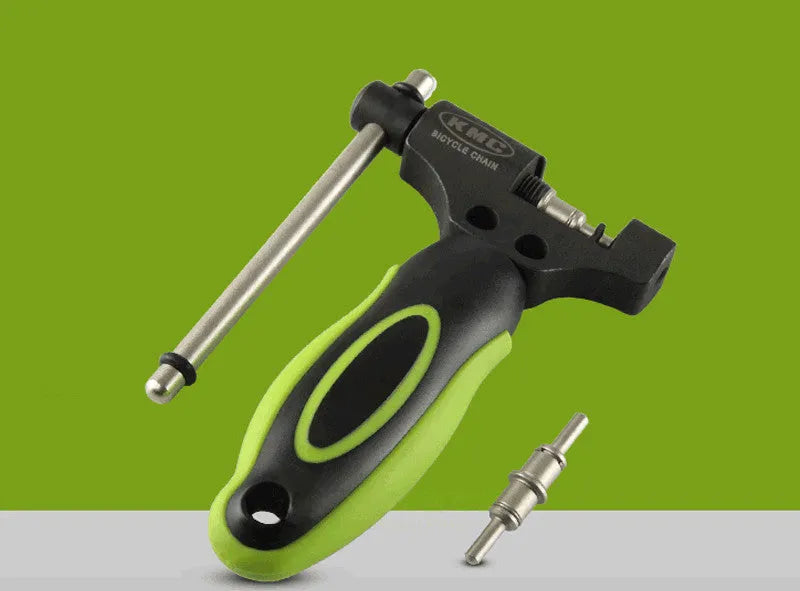 Green steel bicycle chain cutter tool with double shaft device and a separate chain driver.