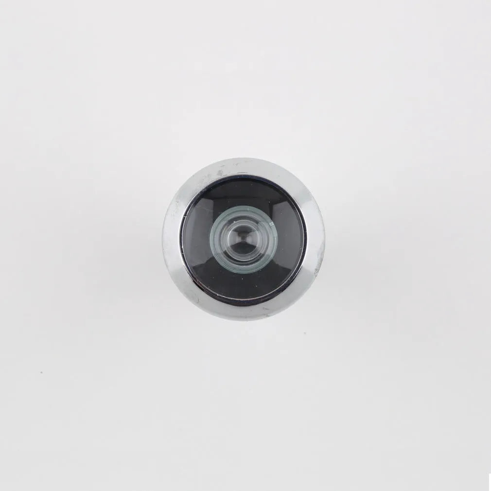 LCD digital door peephole monitor and outdoor camera unit for wireless home security viewing.