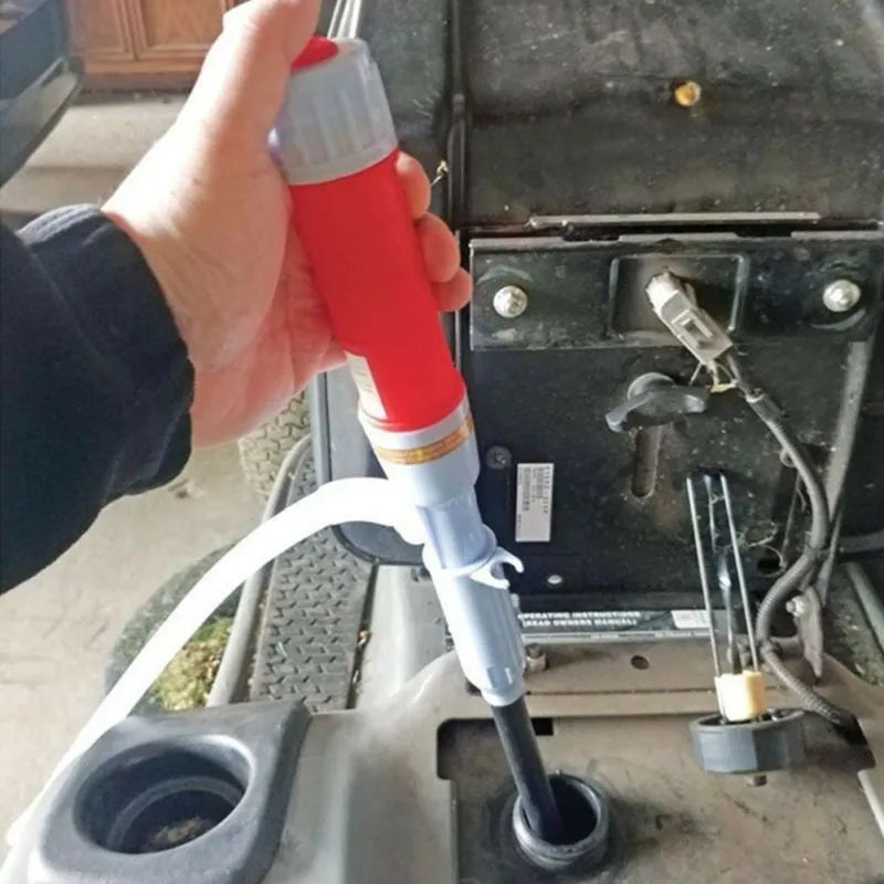 Manual hand-operated siphon pump with blue flexible tubing for transferring gasoline and oil.