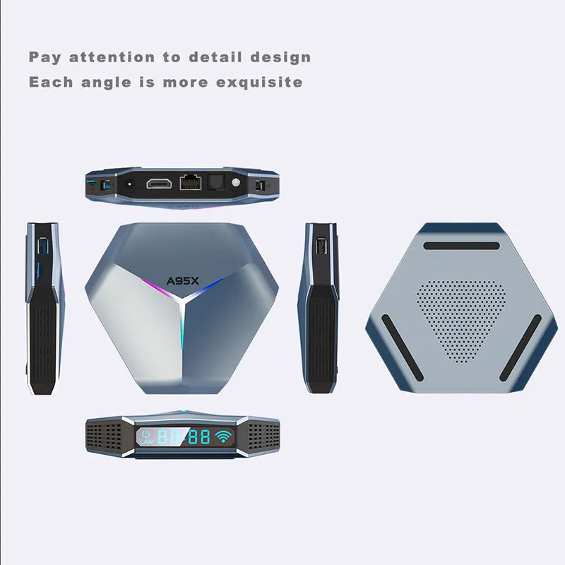 Android 4K TV box set-top box with remote control and cables on a wooden surface.