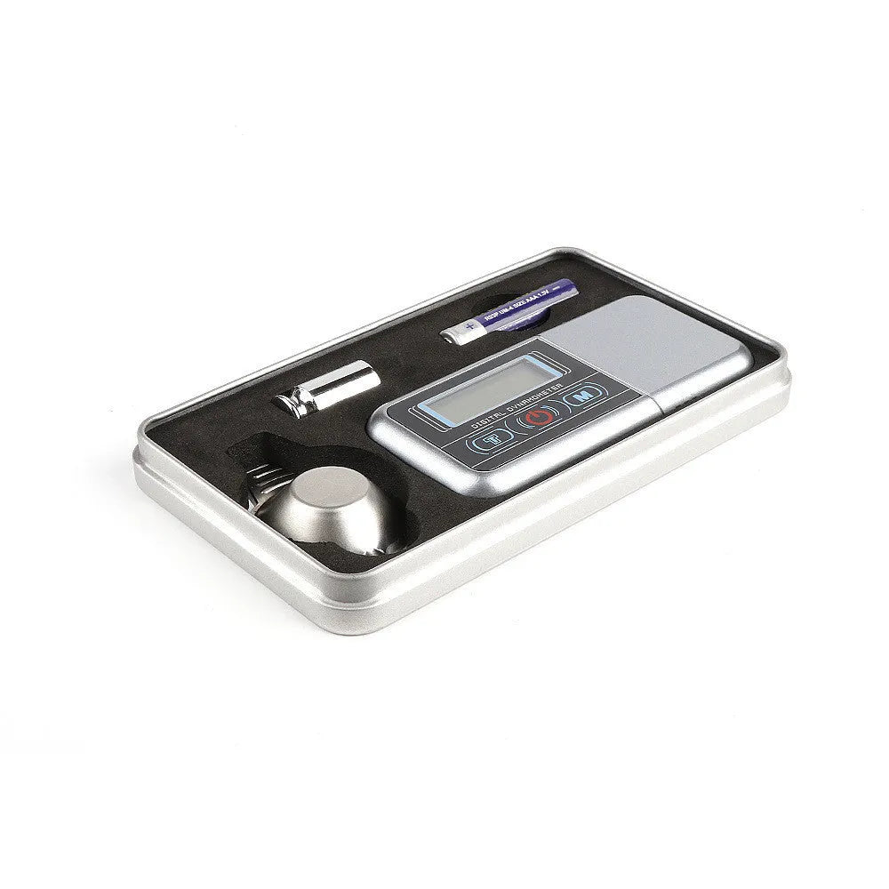 Compact black digital pocket scale showing 0.00g on LCD display, for weighing jewellery and herbs.