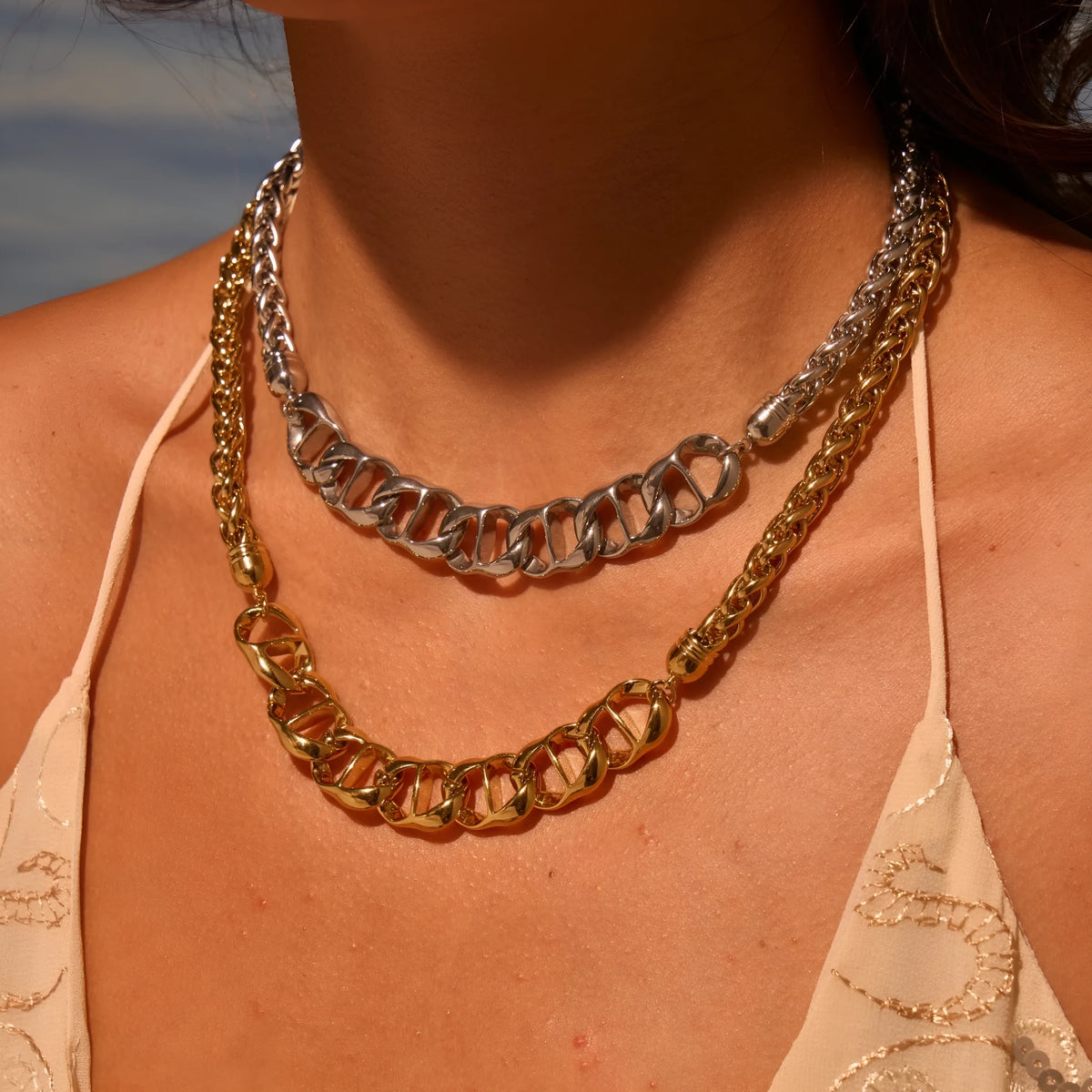 Gold plated stainless steel women's necklace with geometric pendant on regular chain
