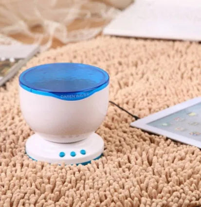 Blue coloured ocean theme LED projection lamp for children's rooms.