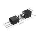 Silver metal mini woodworking lathe with carving tools on workbench