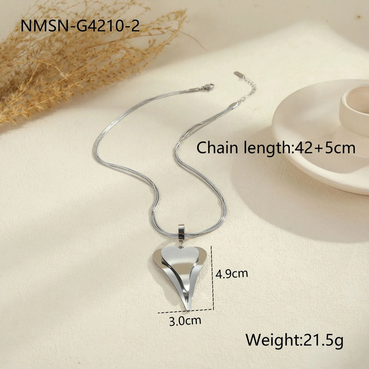 Double heart snake bones geometric pendant necklace in gold or steel finish on regular chain