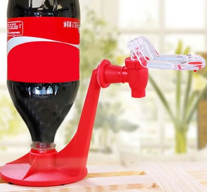 Red Magic Tap soda dispenser attached to 2-litre bottle with push-in mechanism for drink serving