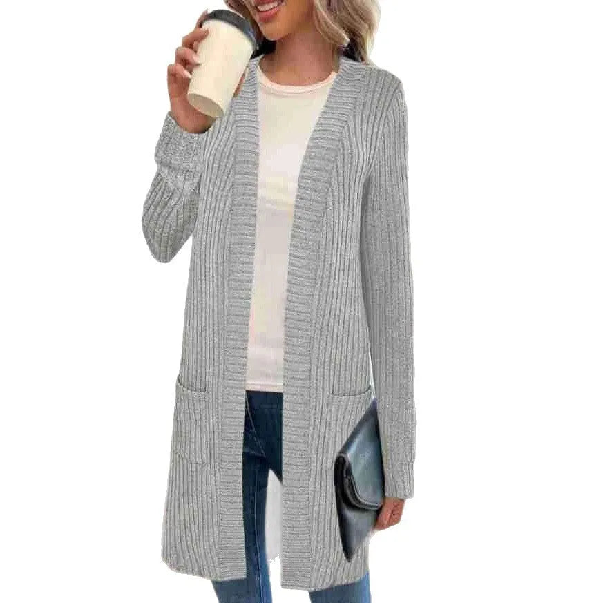A loose-fit long sleeve knitted cardigan jacket in black, grey, or wine red.