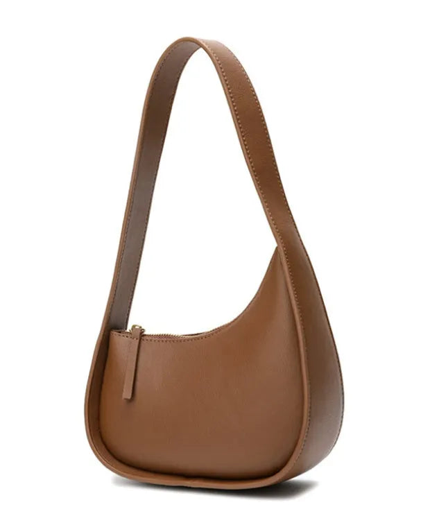 Half moon shaped leather women's shoulder bag with wide strap