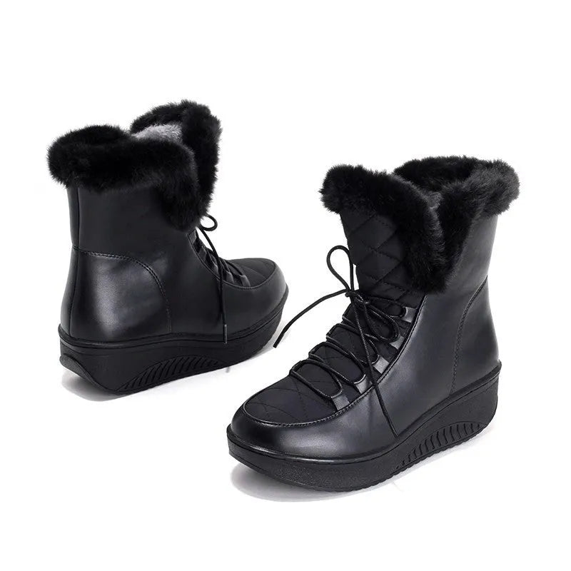 Women's water-resistant winter boots in black with plush lining and 3cm platform sole