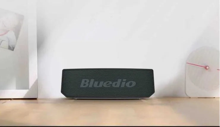 Black BS-6 cloud smart speaker with 52mm driver, compact rectangular design for desk or shelf placement