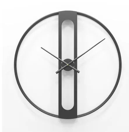 A large 50 cm round metal wall clock on a wall, available in black or gold finish.
