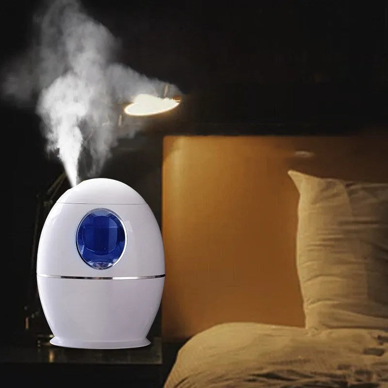 White columnar household air disinfection humidifier with USB cable.