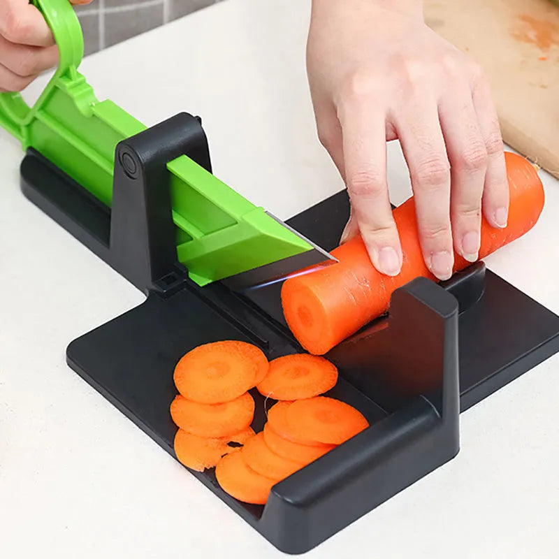 Green and red vegetable cutter with stainless steel blade for slicing carrots and potatoes
