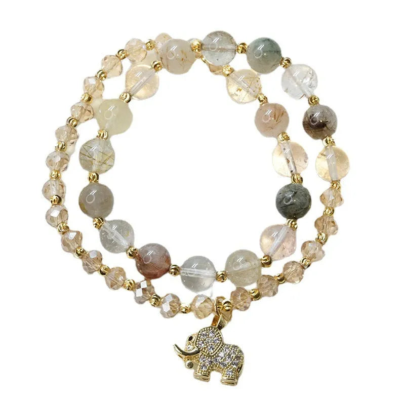 Retro multicolour bracelet for women made with colour hair crystal and strawberry quartz beads.