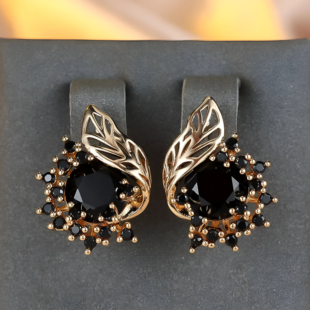 Round flower feather design earrings for women in champagne gold with colourful zircon stone accents.