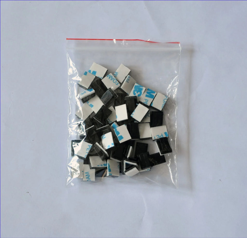 Black PA66 plastic automotive cable retaining clips for wiring management measuring 9mm by 12mm by 6.2mm
