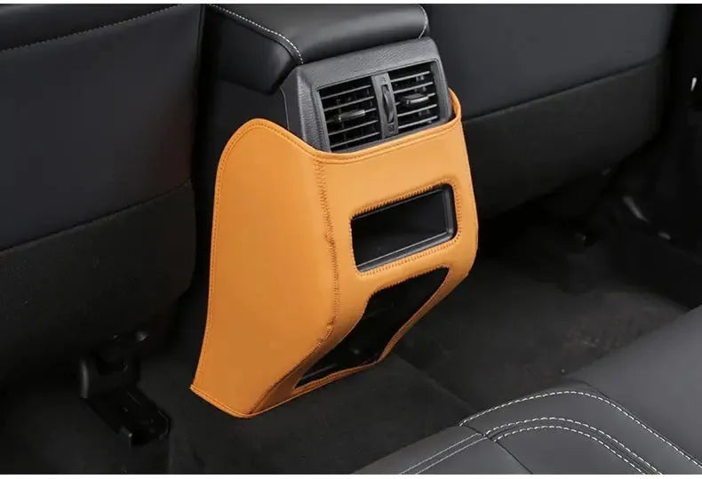 Three leather anti-kick protection pads for 2023 Outlander seats and console in black, grey and brown
