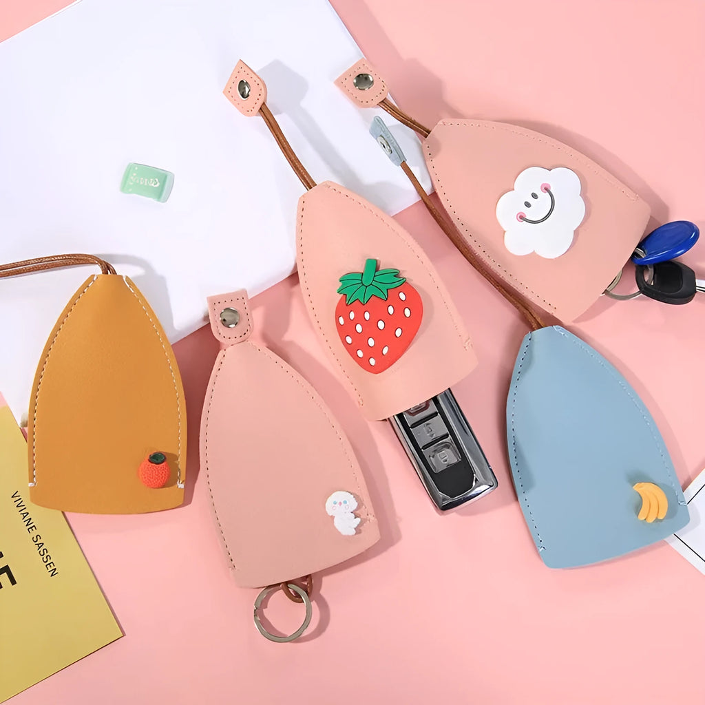 Cartoon-style pull-out car key case made of PU leather in assorted colourful designs