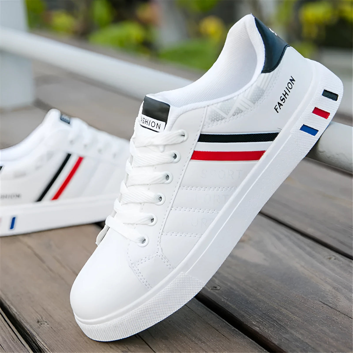 Sports shoes in black, grey and white colour options showing size range 39 to 44.