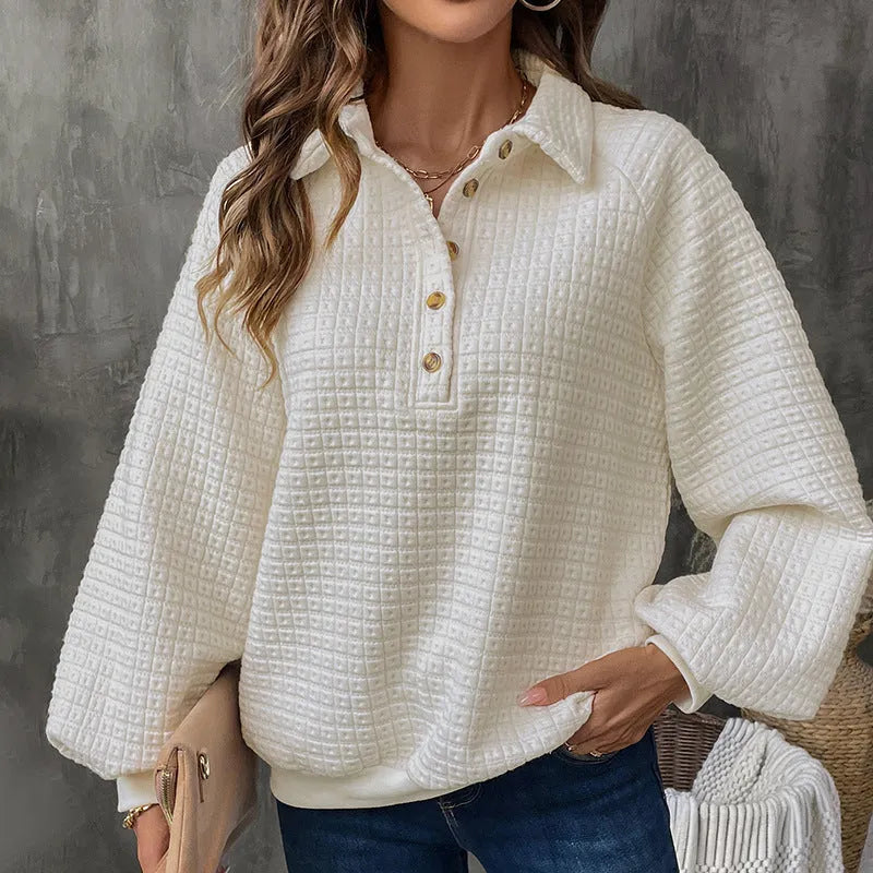 Women's milky white polo collar sweater with long sleeves and textured knit.
