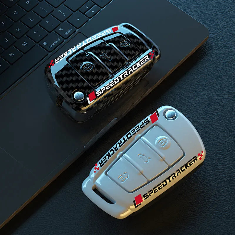 Carbon fibre style car key cover with mirror surface detail in carbon black colour