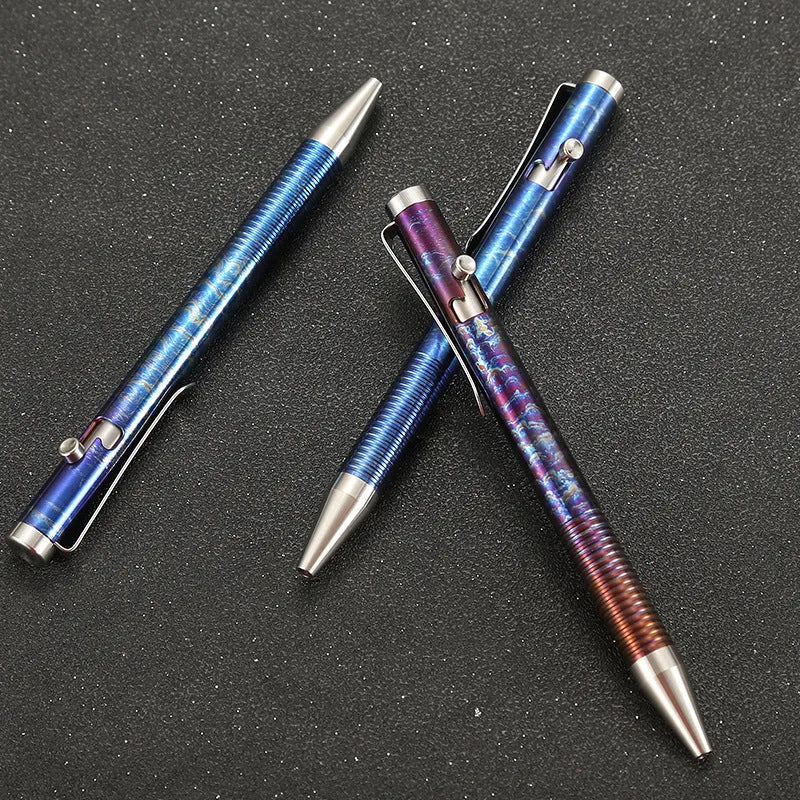 Titanium alloy magic colour pen with gun bolt handle design on a dark background.