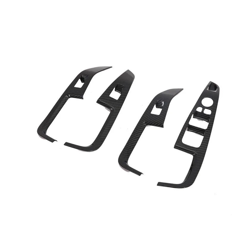 Black ABS plastic centre console trim panel for BMW X5 2019 G05 model with integrated cup holders.