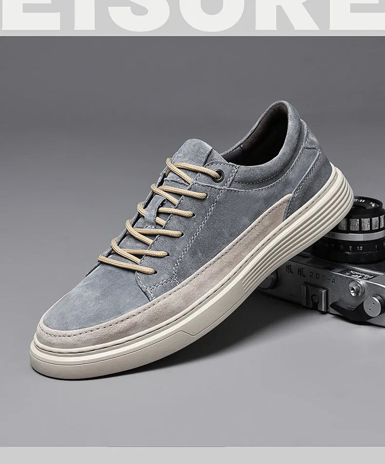 Men's grey casual leather skate shoes with round toe design and rubber sole