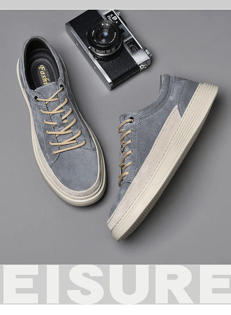 Men's grey casual leather skate shoes with round toe design and rubber sole