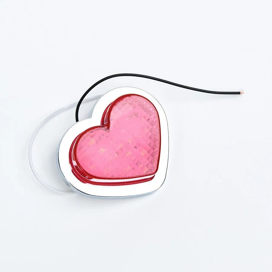 Heart-shaped red LED sidelight for car or motorcycle fender in large size.