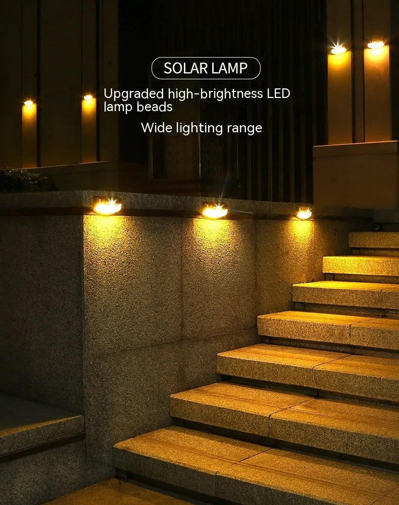 Solar outdoor wall lamp with smiling face design for garden lighting