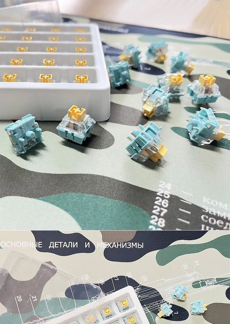 36 Sea Salt Lemon coloured PRO Mute mechanical keyboard switches laid out on a surface.