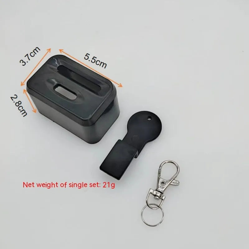 Black and red ABS plastic seat belt buckle lock holder protective device.