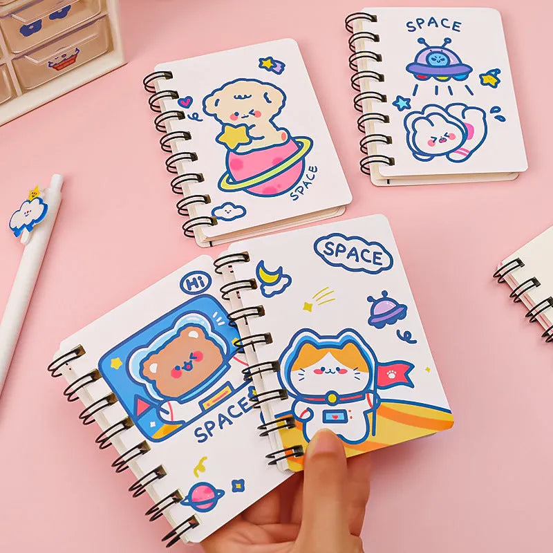 Astronaut series pocket flipper notebook showing compact 10.5x8cm size with space-themed cover design