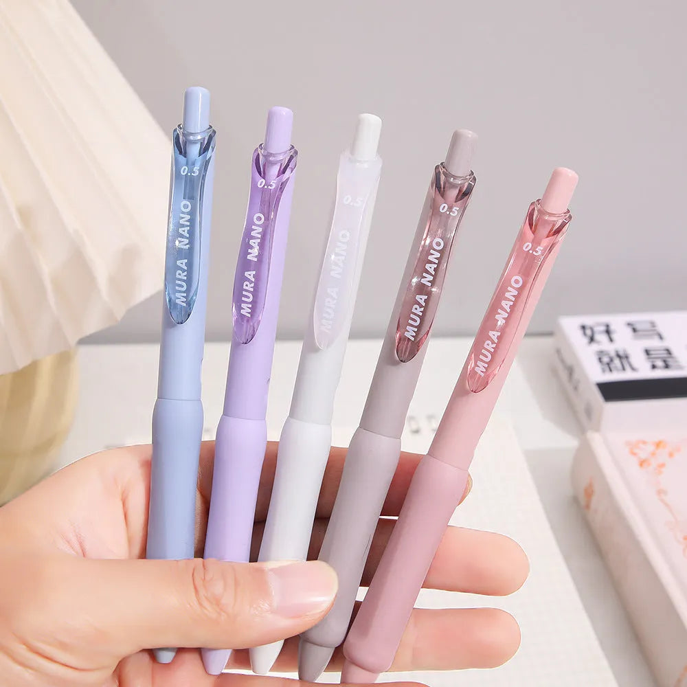 Macaron colour press gel pen with 0.5mm tip in smoked brown, pink, or white.