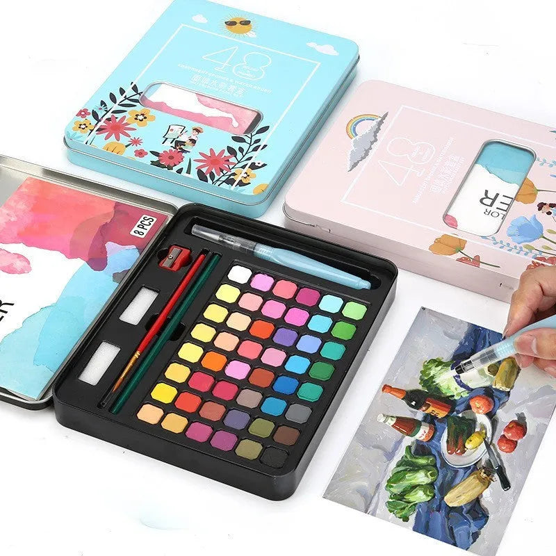 48 colour solid watercolour paint set showing Black Knight, Girl Pink and Sunshine Blue shades