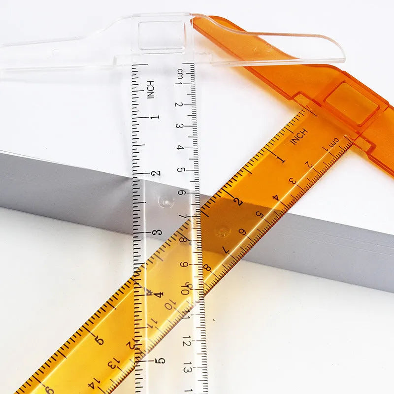 Orange transparent T-shaped plastic ruler with measurement markings on a white background