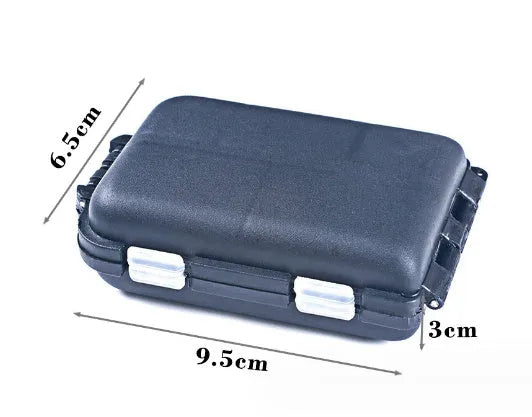 Black plastic fishing tackle storage box with 10 internal compartments, shown next to small fishing hooks.