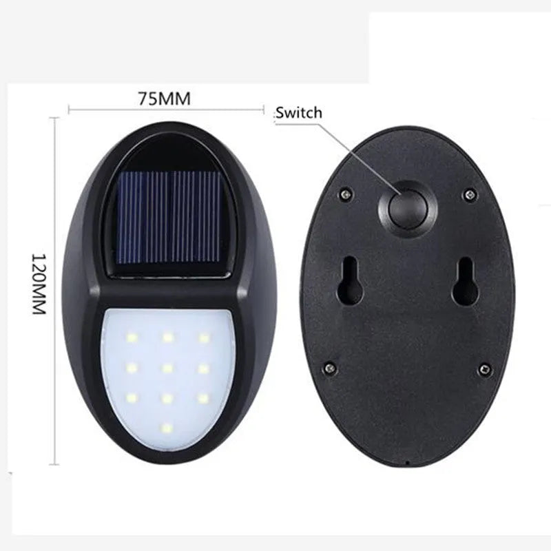 Black rectangular solar-powered LED wall light with solar panel on top.