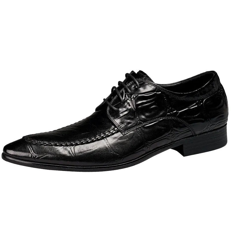 Men's brown leather shoes with alligator pattern texture and a silver horse bit buckle on the front.