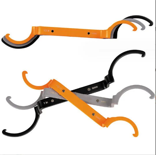 Orange, grey, and black crescent wrenches with magnetic suction lock in a three-piece tool kit.
