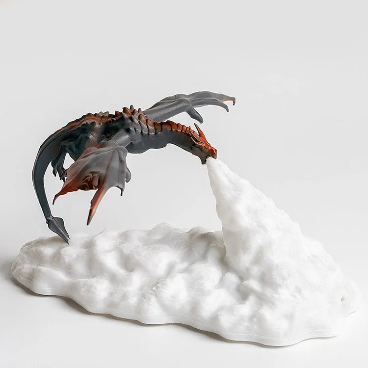 3D printed fire-breathing dragon night light with warm red glow and USB charging cable