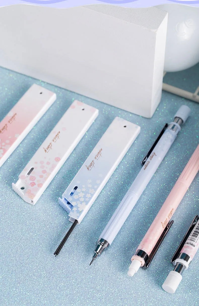 Cartoon style automatic pencil set with three pens and HB lead refills in mixed colours.